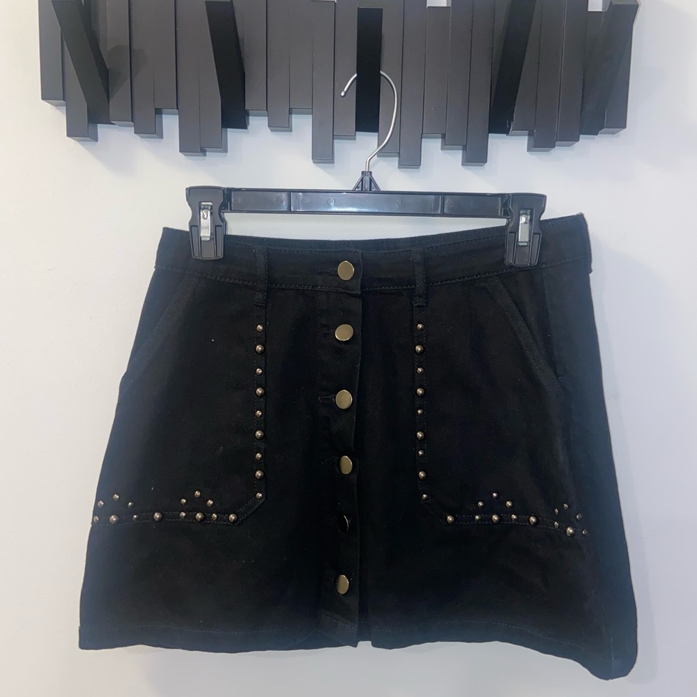 Adorable high rise black denim mini skirt size S.
